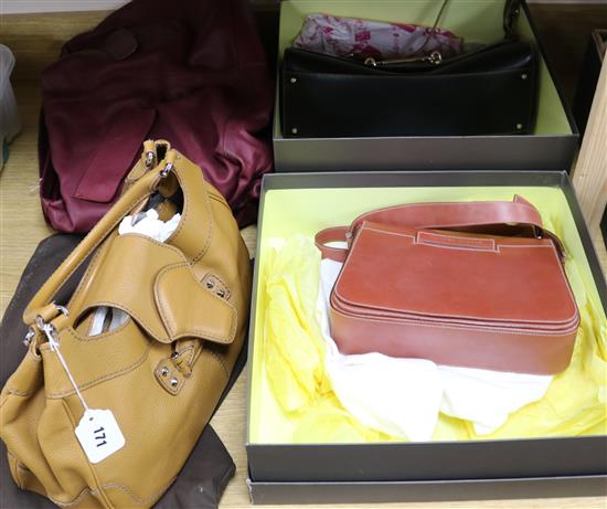 Three designer leather handbags, including Tanner Krolle (2, boxed) and Tods and a Russell & Bromley handbag (4)